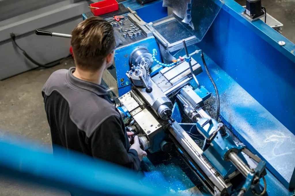 young mechanical engineer working on steel machine 2025 04 03 19 46 49 utc